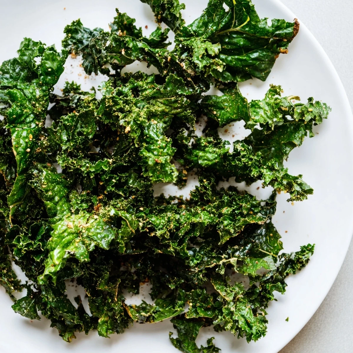 Golden, crispy kale chips baked until perfectly crunchy and lightly seasoned for a healthy snack.