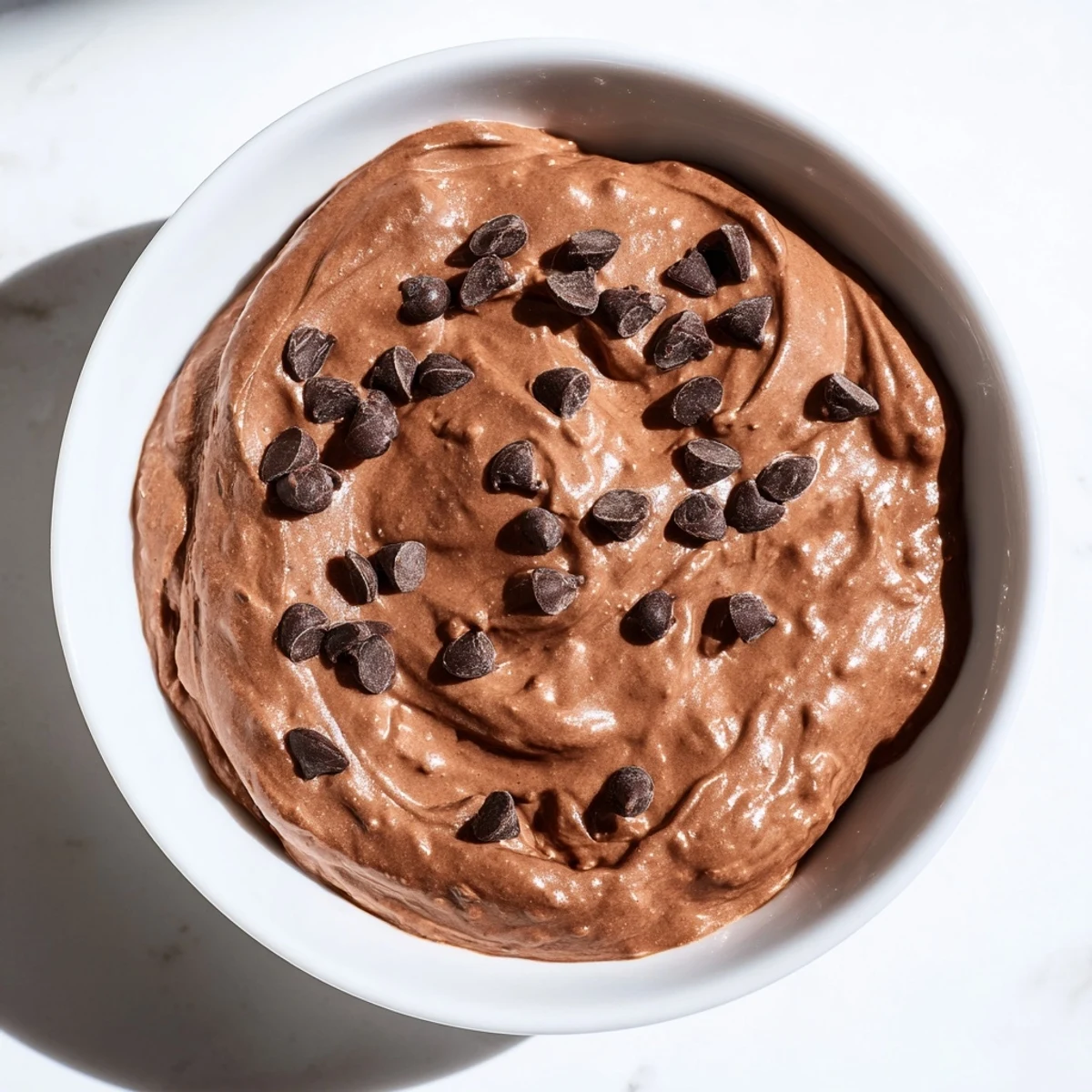 Gluten-free Brownie Batter Dip, a rich, chocolatey treat perfect with fresh fruit and pretzels.