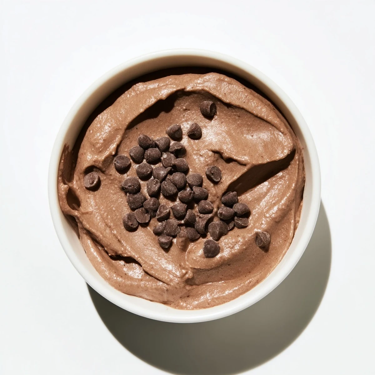Bowl of luscious, gluten-free Brownie Batter Dip, ideal for dipping cookies and satisfying cravings.