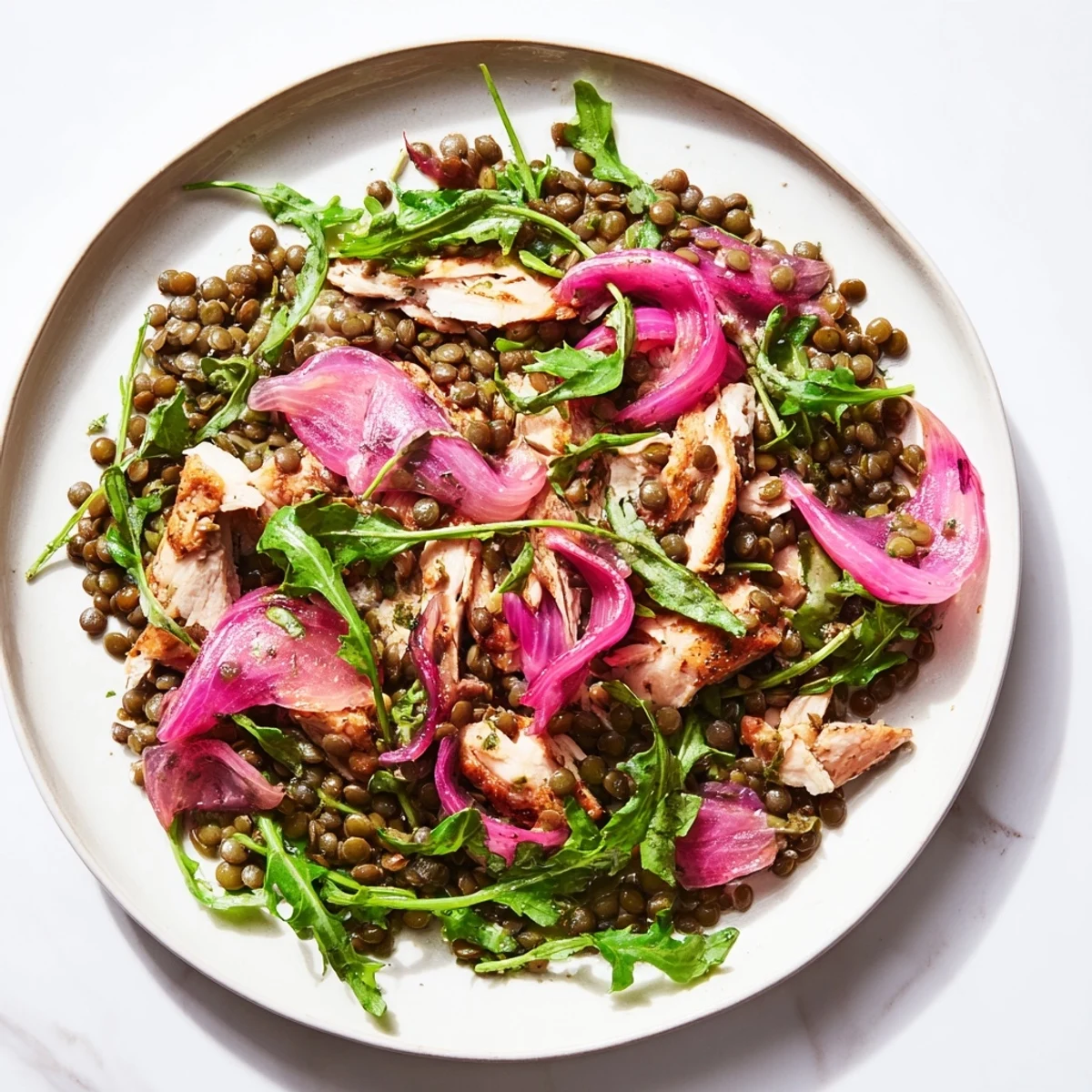 Lentil & Chicken Spring Salad with tender lentils, juicy roasted chicken, and peppery arugula.