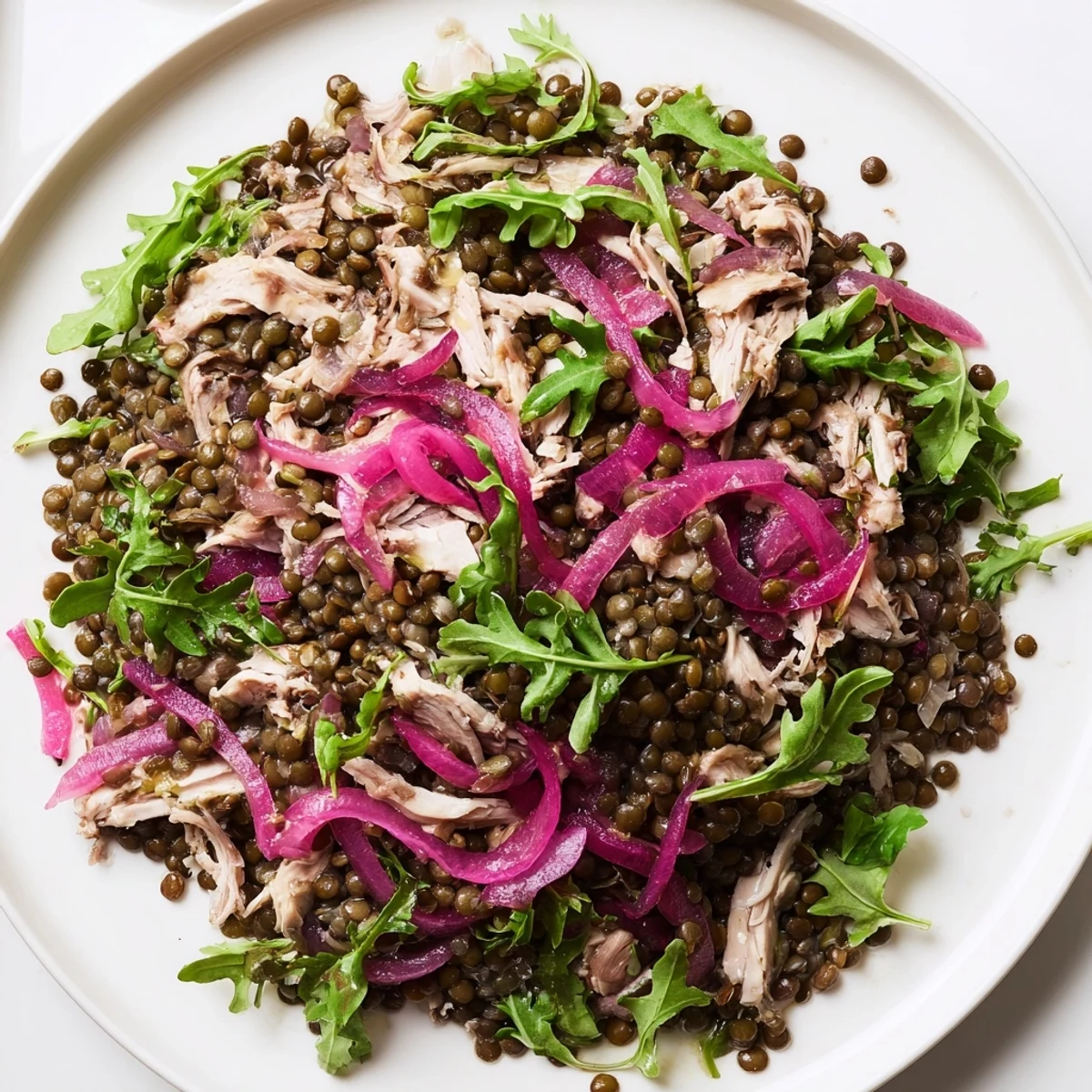 Fresh Lentil & Chicken Spring Salad served with cherry tomatoes and cucumber, perfect for a light lunch.