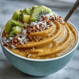 Close-up of a tropical Mango Chili Lime Smoothie Bowl, breakfast perfection.