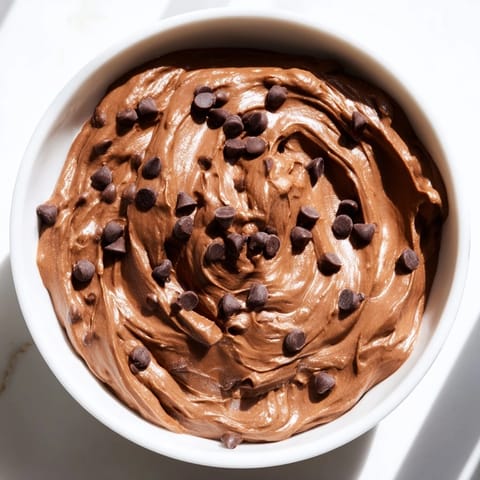 Decadent photo: Creamy gluten-free Brownie Batter Dip swirled with chocolate chips, ready to scoop.