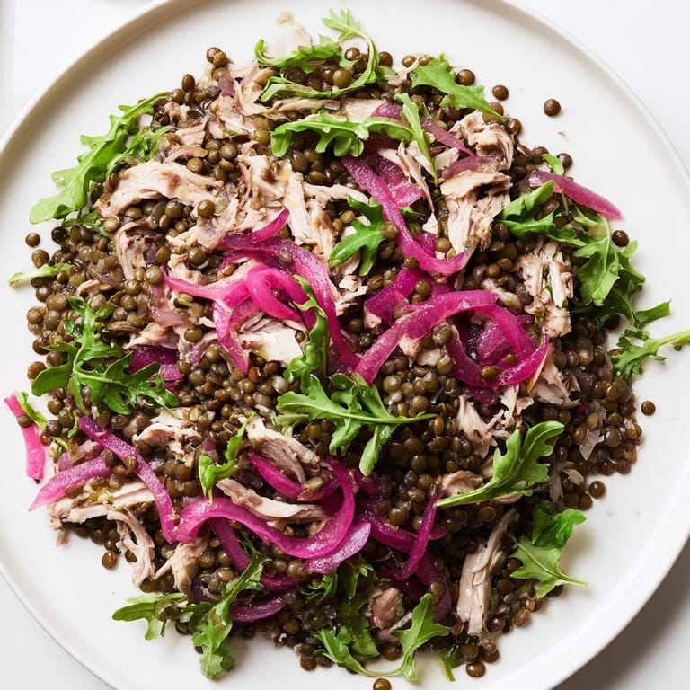 Fresh Lentil & Chicken Spring Salad served with cherry tomatoes and cucumber, perfect for a light lunch.